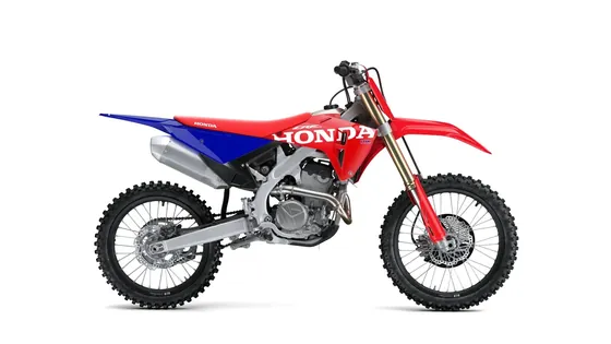 Motocross Motorrad Honda CRF250R in Rot, Weiss und Blau von der Seite